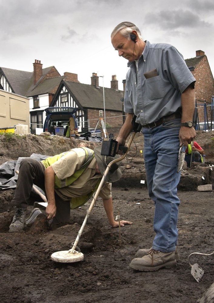 Metal detecting on an archaeological dig